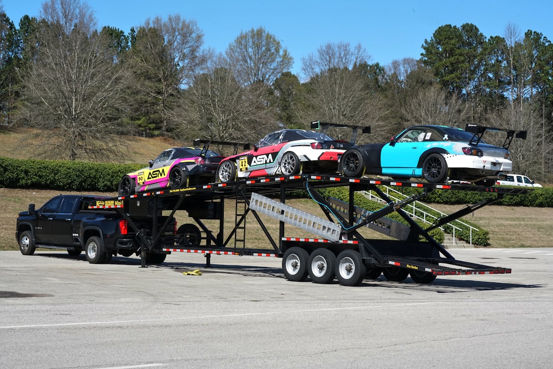 Car hauler trailer loaded with vehicles